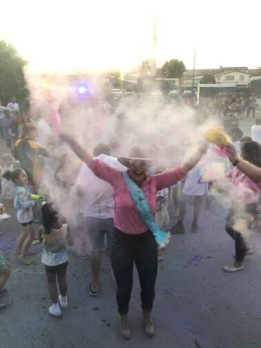 Mount Isa Rodeo Queen Quest Entrant Aimee Sewell sprays colour at her disco event. Photo supplied.
