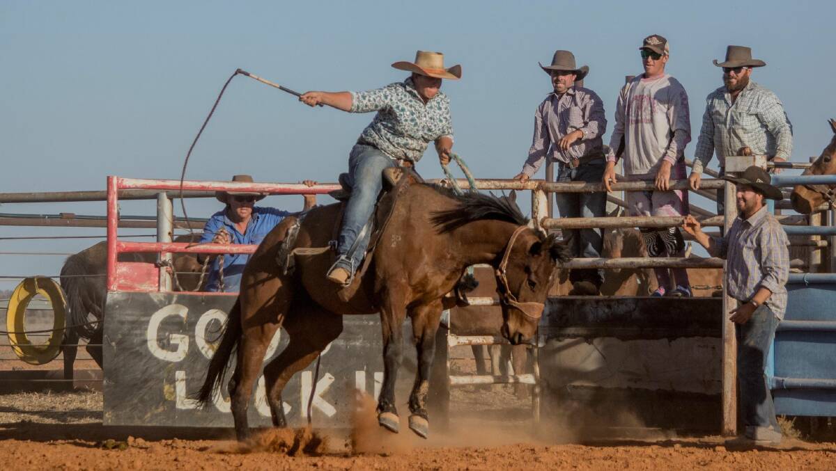 Kath McQueen started competing in the station buckjump and now progressed to learning to bronc ride. Photo supplied.