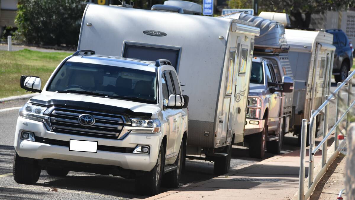 Caravans line the Mount Isa CBD street along Rodeo Drive instead of using designated caravan and RV parking. Photo: Samantha Campbell.