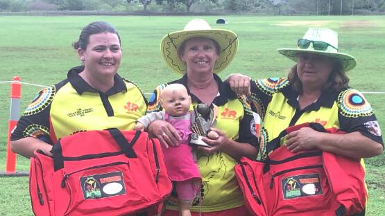 Winners are Grinners: Kim Smith and Bev Peters from Mount Isa along with Sharon Stockwell from Townsville show off their prizes. Photo supplied.