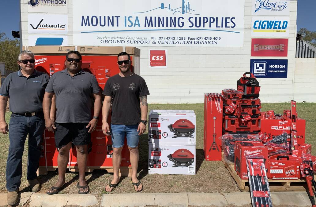 Winners: Mount Isa Mining Supplies owner Brett Peterson with major prize winner Jude Moon and runner up Jordan Wardle. Photo: Samantha Campbell.