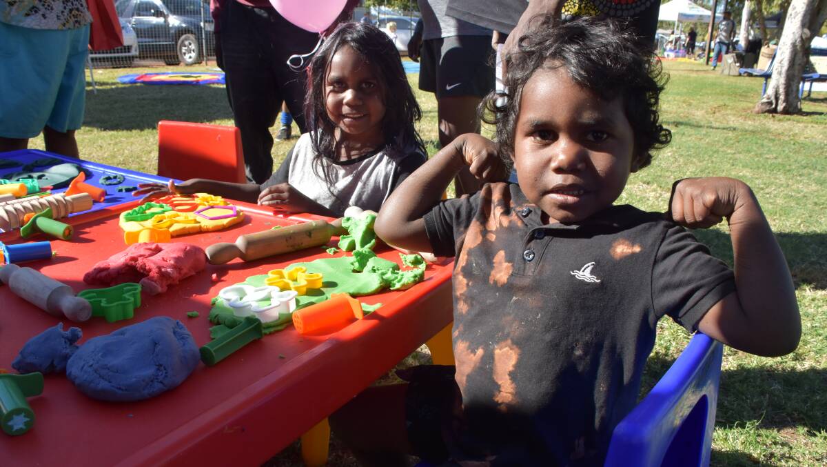 FUN: Timiara and Timothy Anderson take part in the activiites held a Minnie Davis Park. Photo: Samantha Walton.