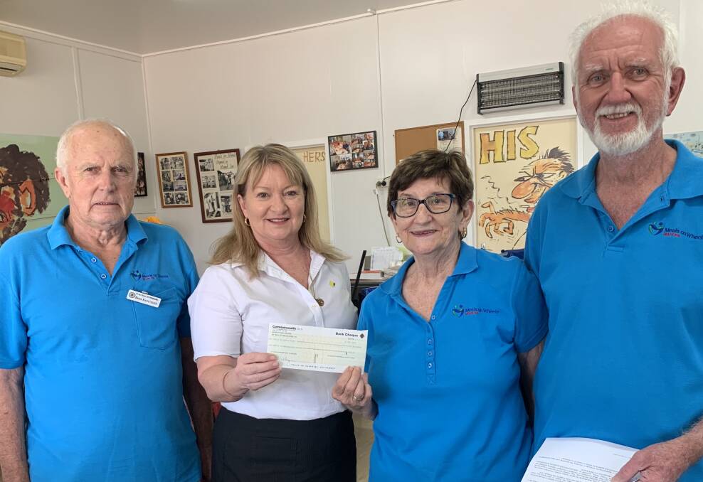 Mount Isa Commonwealth Bank donates $500 to Meals on Wheels. Photo supplied.