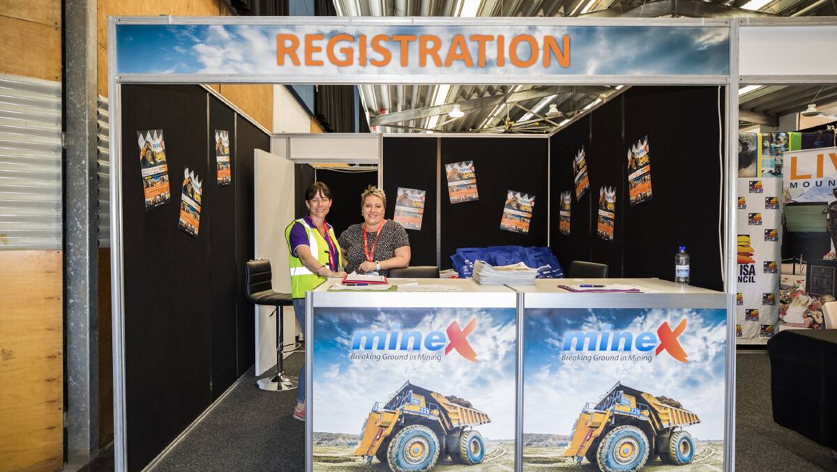 REGO: MineX Coordinators Katie Schrodter and Beth Anderson prepare to welcome guests at the 2017 event. Photo supplied.