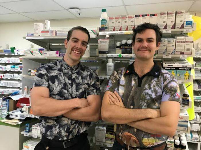 Pharmacists Josh Brock and Toby Wicks sporting their Movember mo’s. Photo supplied.