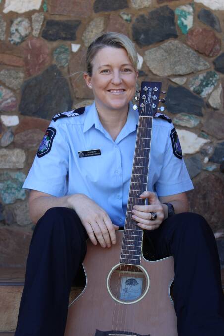 ARTIST: Mount Isa Policewoman Cath Purcell accepted for a music program in Tamworth, New South Wales. Photo: Samantha Walton.