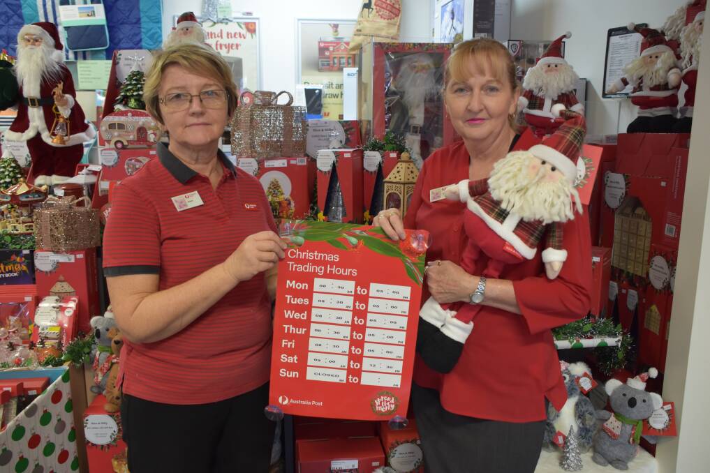 BUSY: The ladies at Mount Isa Post Office are ready for an influx of customers ahead of Christmas. Photo: Samantha Campbell