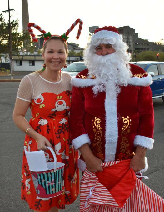 2019: Event organiser Megan Crowther and Santa. Photo: Samantha Campbell