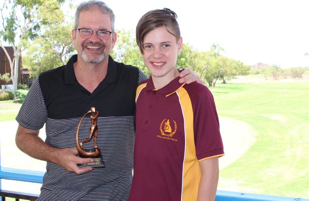 CONGRATS: Mount Isa Summer Golf competition winners Brian and Tayge Atherinos. Photo supplied.