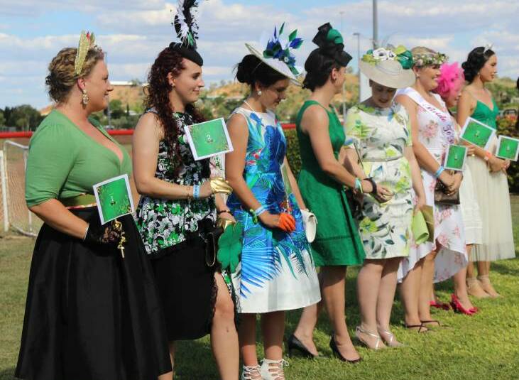 Ladies line up for the St Patrick's Day Races fashions on the field.
