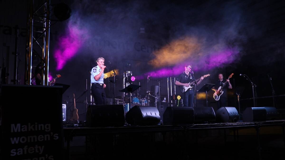 Lead singer Cath Purcell sings with her band The Hoax in Mount Isa. Photo supplied.