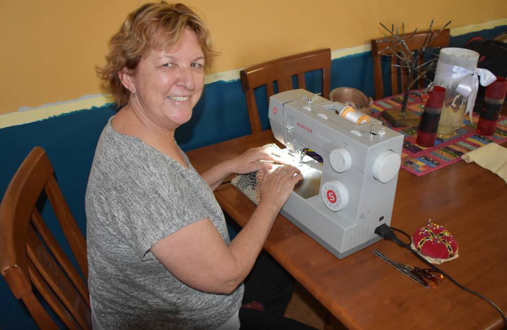 SEWING: Melonie is creating face masks for locals in need. Photo: Samantha Campbell.