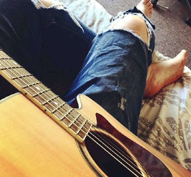 Dust of that guitar, download a few song chords and give it a whirl! Photo: Samantha Campbell.