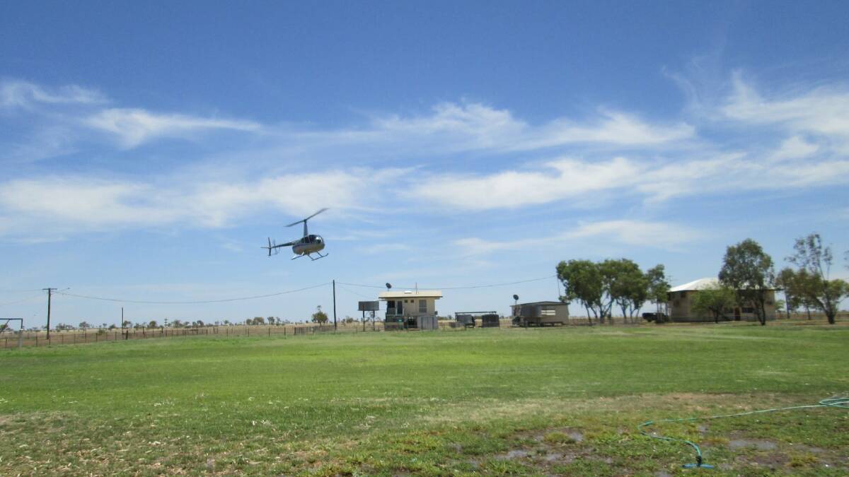 The Salvation Army fly into Camooweal State School. Photo supplied.