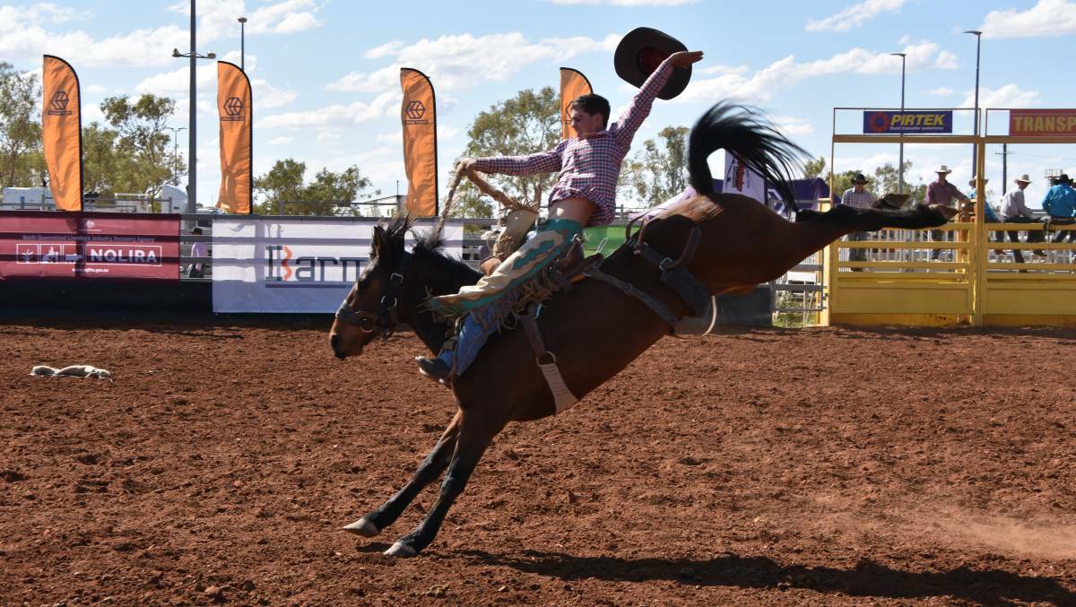 ACTION: Damien Brennan in the open saddle bronc ride at the 2019 Curry Merry Muster Festival. Photo: Samantha Campbell
