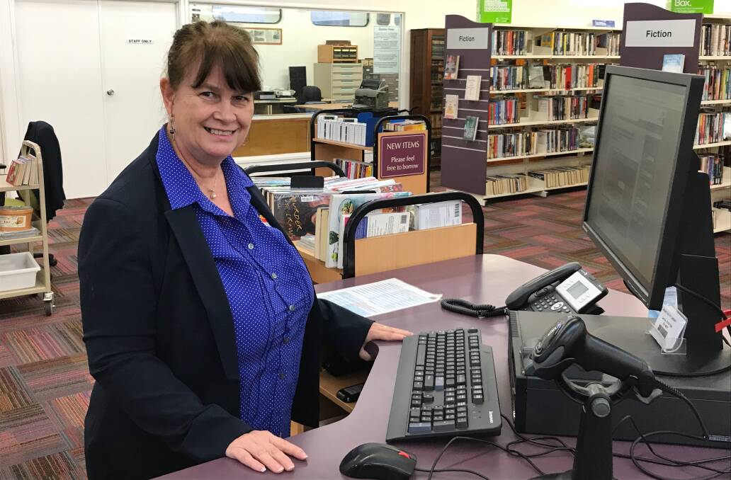 ADVANCE: Mount Isa library coordinator Lois Huston brings in technology. Photo: Samantha Walton.