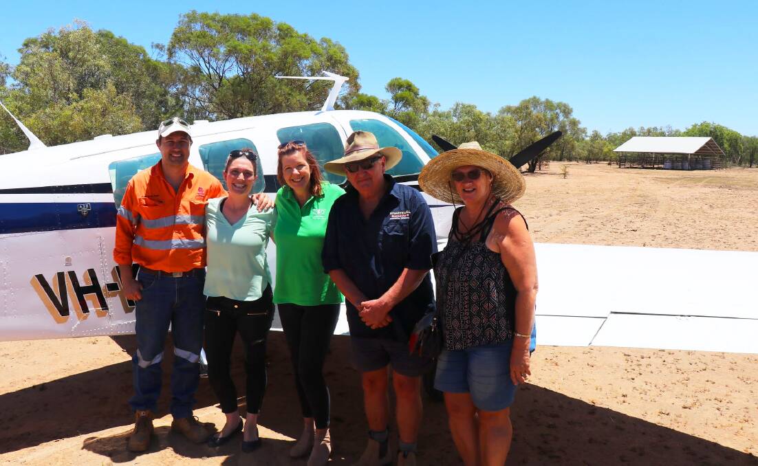 THANK YOU: Graziers thank Flinders Medical Centre doctor Emma Gillmore and her husband Charlie for flying in medical supplies. Photo supplied.