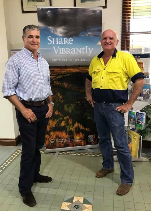 Member for Traegar Robbie Katter talking to Mayor Jack Bawden on the long term effects for the February monsoon would have on small business in his shire.