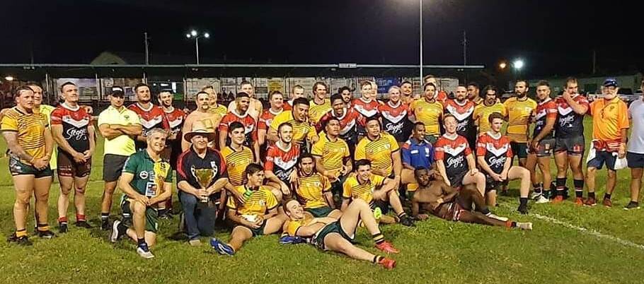 Both teams came together as one after the game, Atherton 44 to Mount Isa 10. 