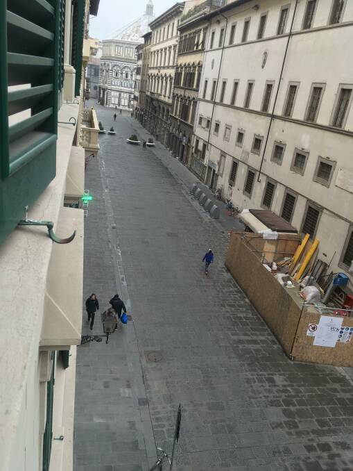 Walking through the empty streets of Italy.