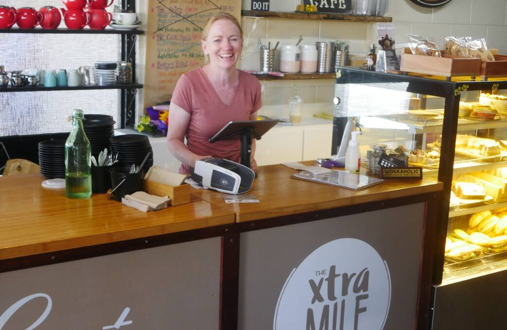 Xtra Mile coffee shop owner Katrina Gall is doing her bit for the community. Photo: Aidan Green