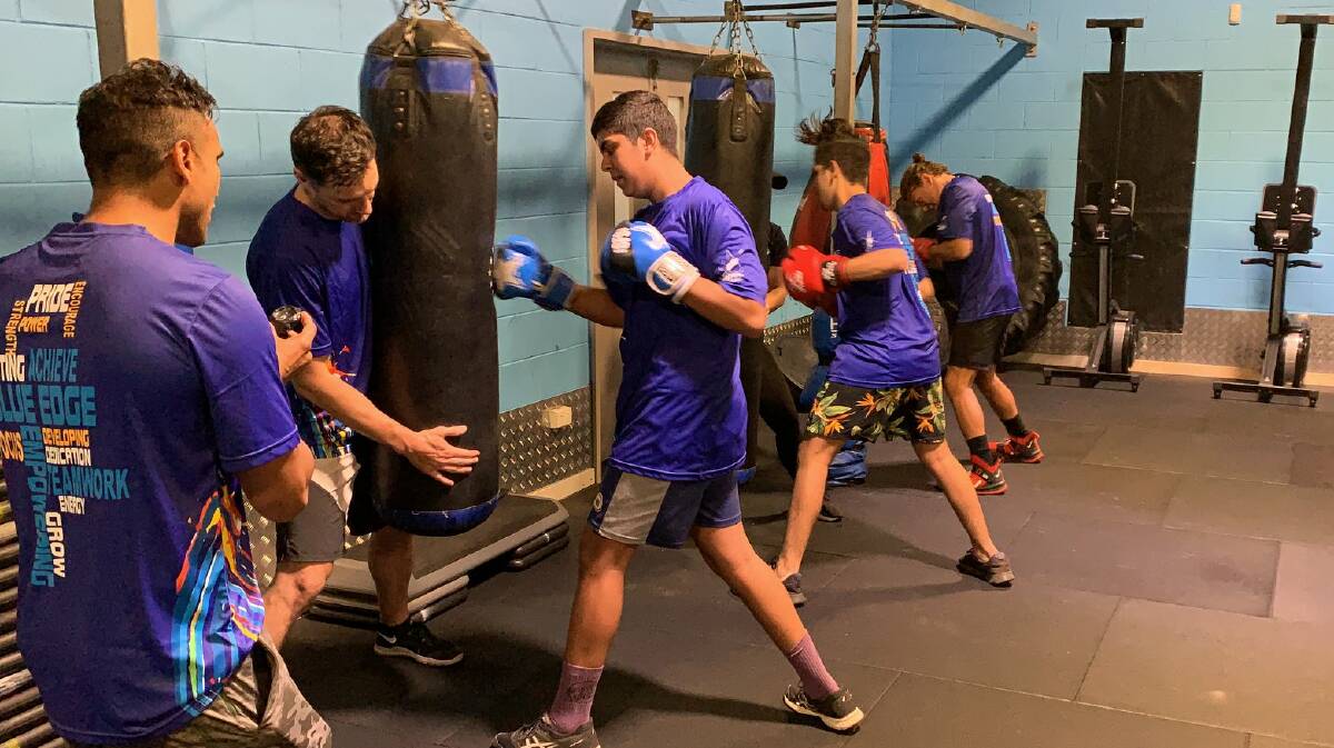 INSPIRE: Blue EDGE students hitting the bag at Mount Isa PCYC. 