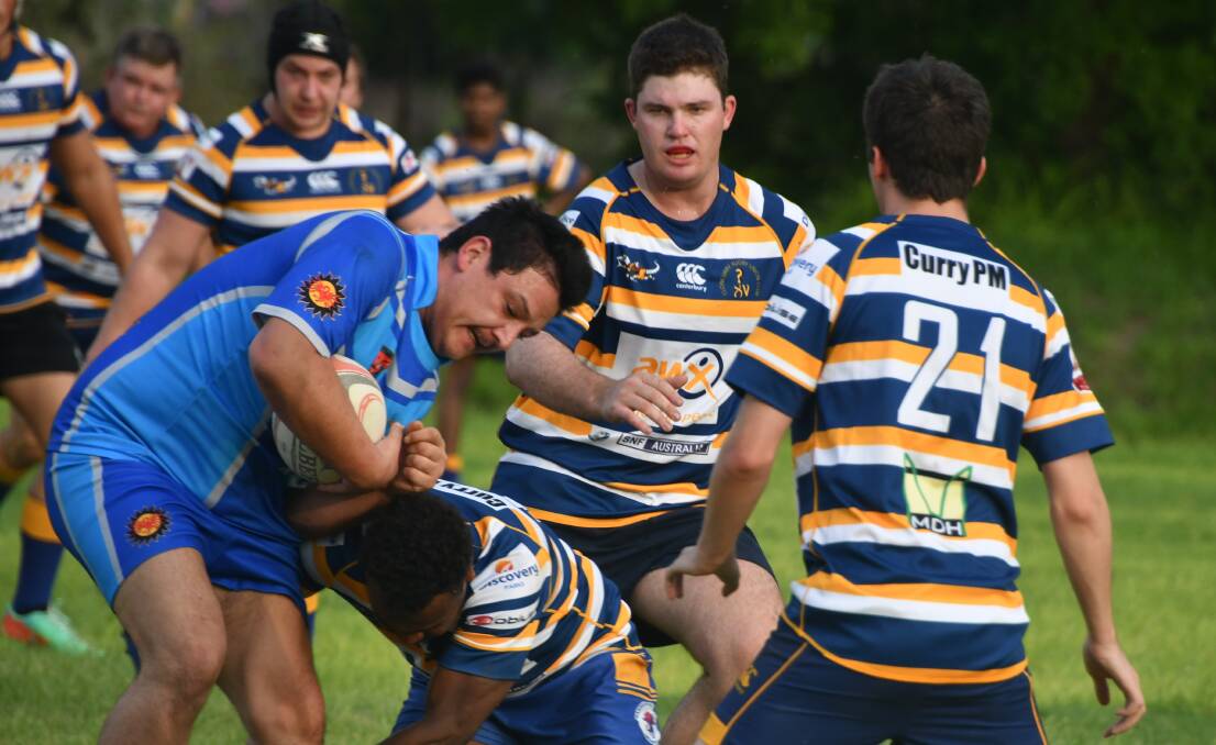 The Cloncurry defensive line became fatigued after several turn overs. Photo: Derek Barry. 