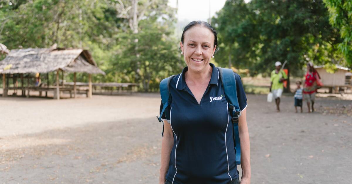 MED-SHIP: A smiling Jodi Brown after treating a patient in PNG. 