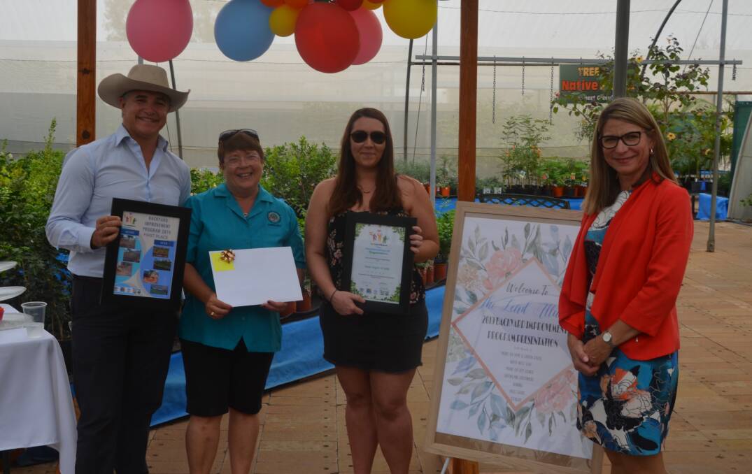 DUST FREE: Simone Langtree (third left) wins the 2019 Lead Alliance Backyard Improvement Program. Seen here with Robbie Katter, Adels Grove Park Manager and Co-owner, Michelle Low Mow and Mayor Joyce McCulloch. Photo: Aidan Green. 