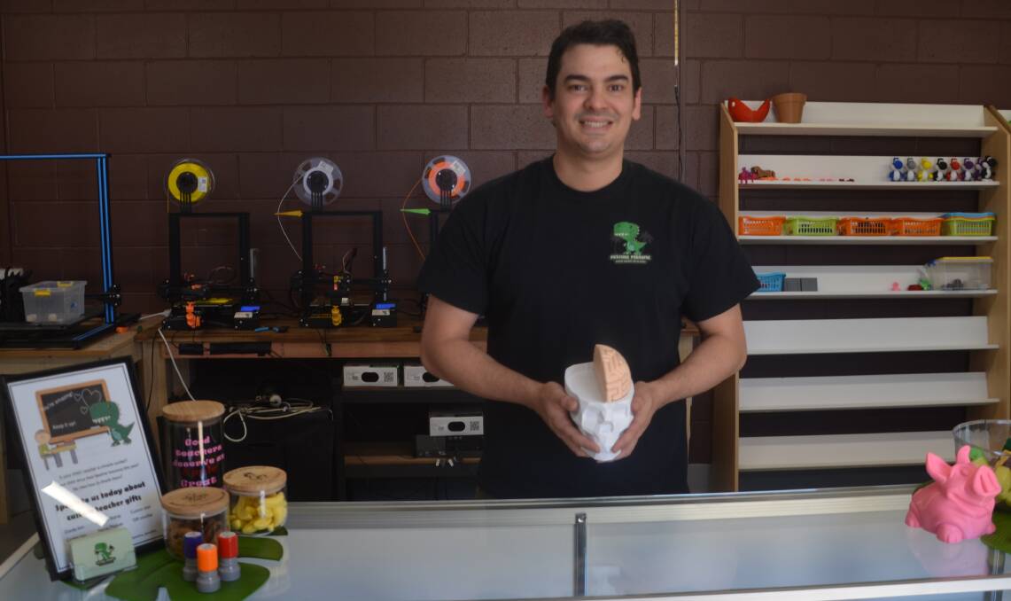 PASTIME PARADISE: Mike Powell holds a brain he printed at his 3D printing store in Mount Isa. Photo: Aidan Green 