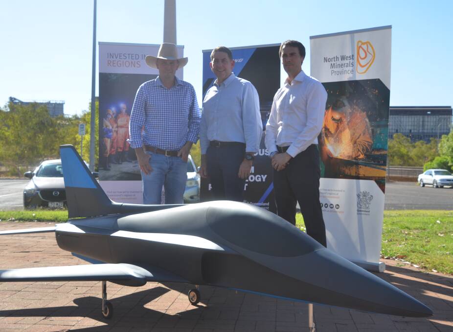NEW AGE: Cr Greg Campbell, Minister Cameron Dick and Rob Hargraves checking out a new drone in Mount Isa. Photo: Aidan Green. 