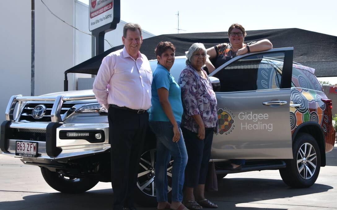 Lee Pulman, Patrica Richards, Mona Phillips and Trish McNamara with the new wheels at Bell and Moir Toyota. Photo: Aidan Green