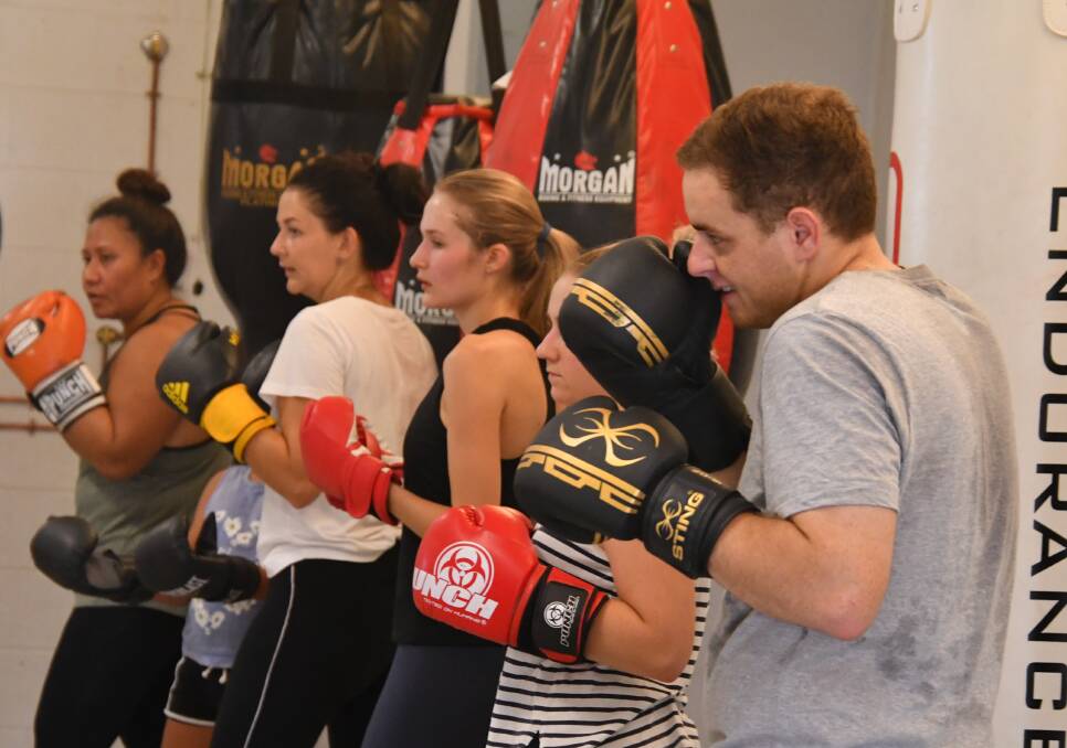 GOLDEN PUNCH: The sessions involved both boxing and fitness. Photo: Derek Barry. 
