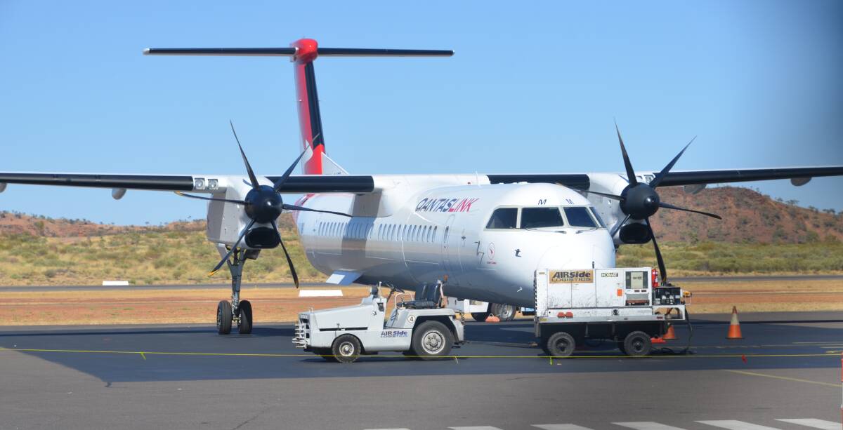 DELAYED: The Qantas pilot found a hairline crack in one of the wheels which had to be replaced. Photo: Aidan Green