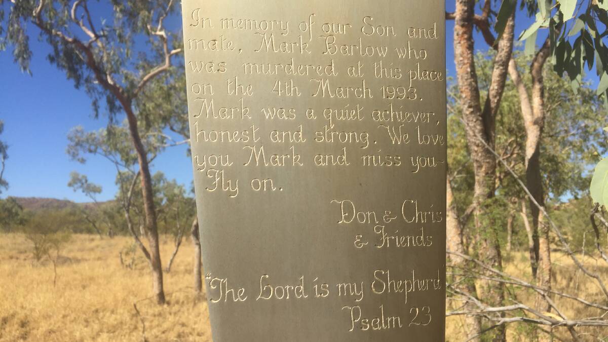 The inscription from Mark's parents on the cross.