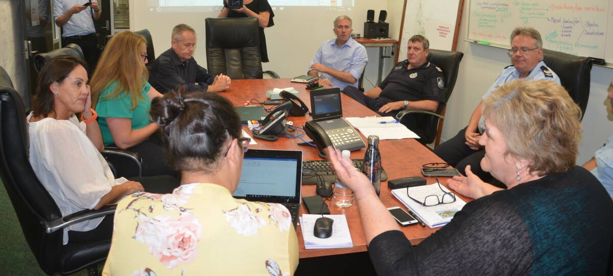 LISTENING: Opposition leader Bill Shorten and Labor Senator Anthony Chisholm attend Cloncurry's Disaster Management Group meeting on Tuesday. Photo: Derek Barry