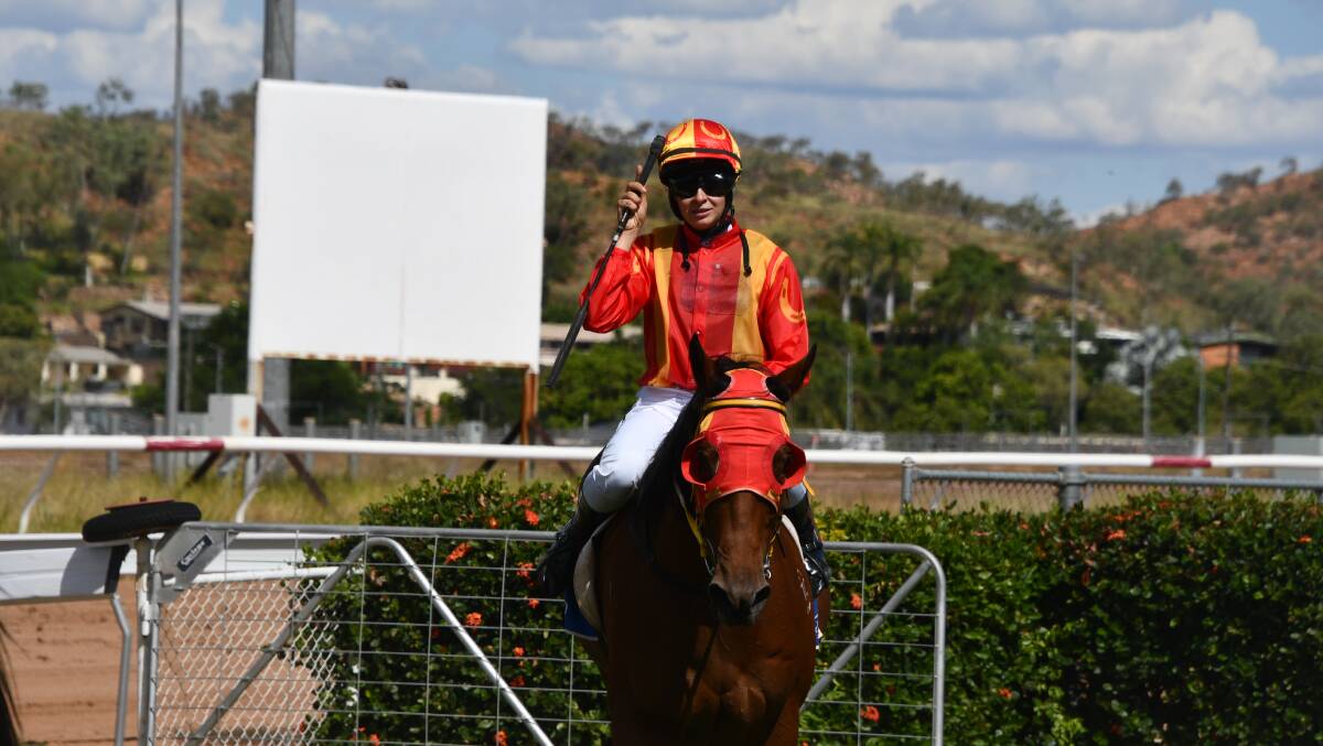 Jenna Edwards salutes the crowd after winning Mount Isa Race 3 on Saturday on All About Me.