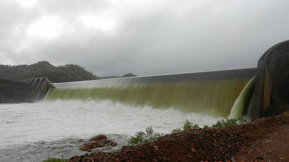 Lake Julius topples over the spillway. The Lake is currently over 100pc full. Photo: Sunwater.