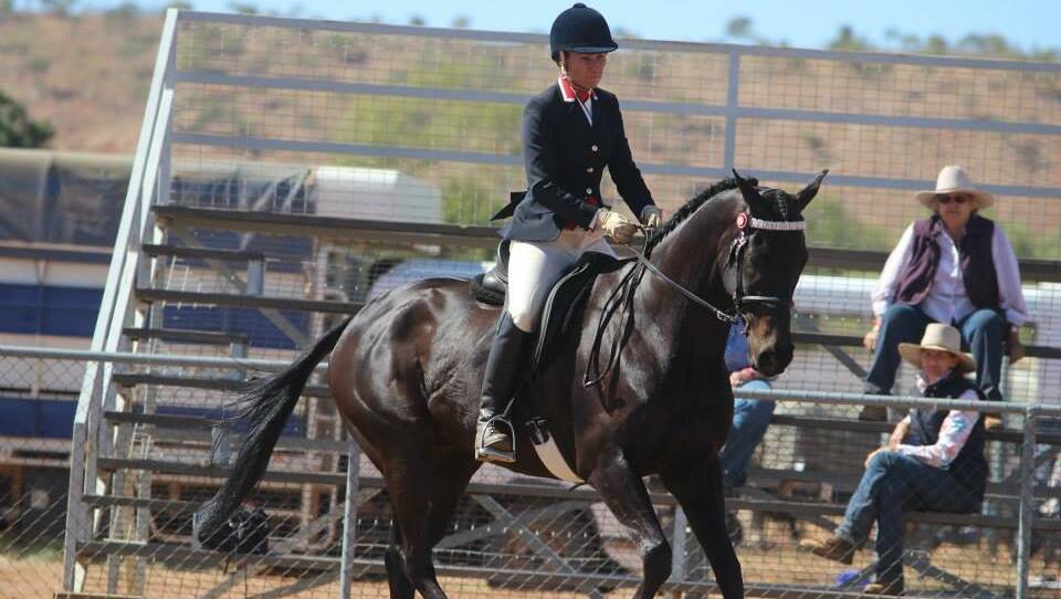 RIDING RETURNS: Denise Abdy riding the Crossland family owned showhorse, Vite Noir at the 2015 Show. Photo Sharon Crossland