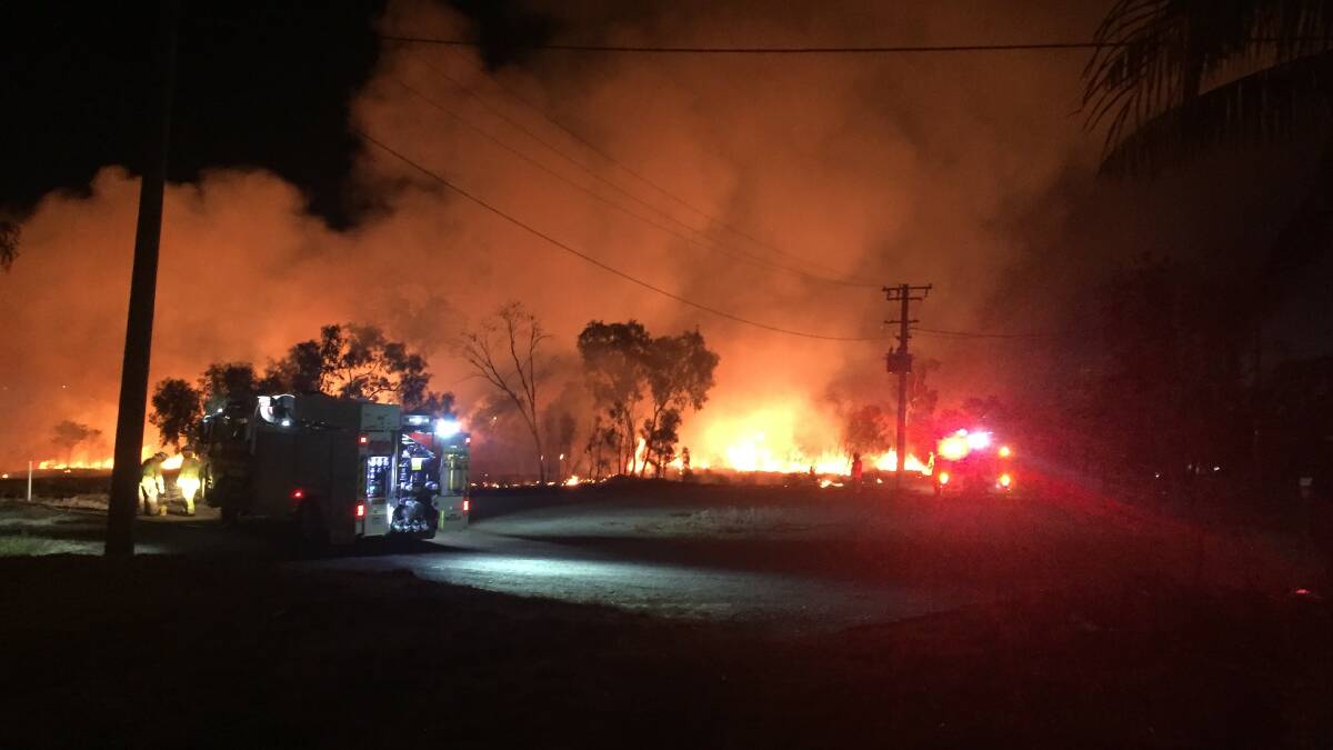 Firies attend the scene on Wednesday night.