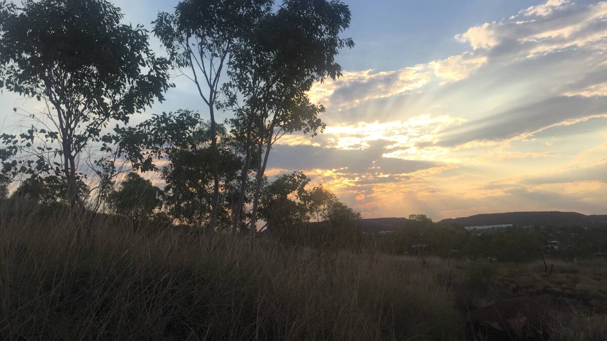 TIMELESS: Mount Isa put on a lovely sunset on Friday. Forecasters are saying there could be a shower or two most days this week. Photo: Derek Barry