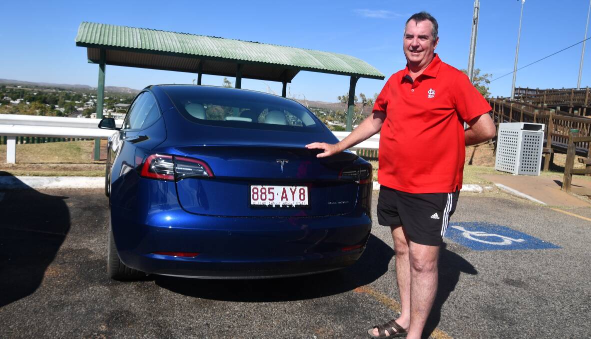 Phil Smith takes his Tesla to the Mount Isa Lookout.