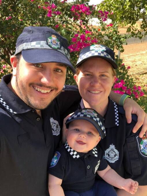 FAMILY TIES: Acting Sergeant Kyle Dennison, fiance Constable Bianca Carloss and their daughter (and officer in training) Willow. Photo: QPS.