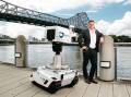 Plotlogic founder and CEO Andrew Job in Brisbane with an OreSense. 