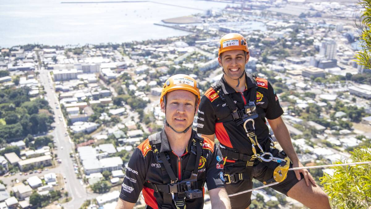 Penrite Racing Holden drivers' David Reynolds and Anton De Pasquale abseiled down the famous North Queensland landmark, two days before they hit the track.