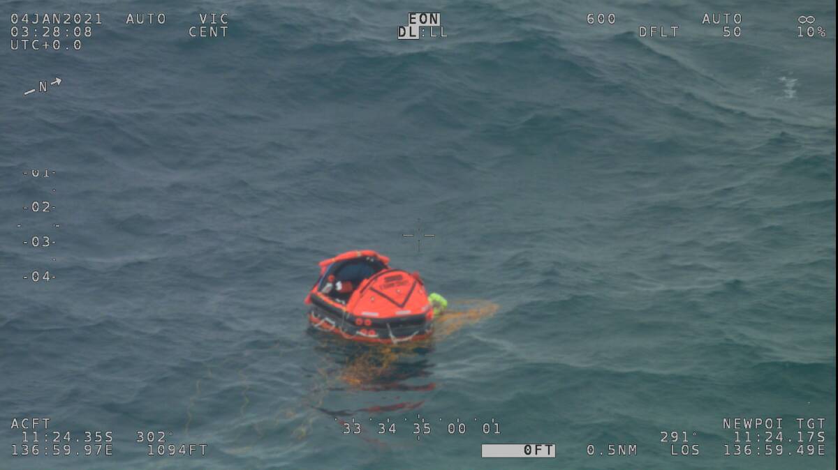 AMSA life raft dropped to survivor in ocean.