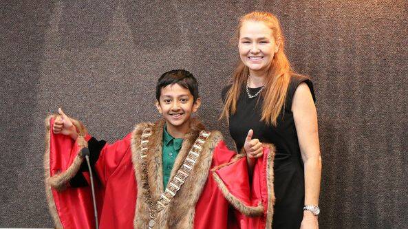 St Joey's Y4 student Abdu was elected "mayor" wearing the robes normally worn by Cr Danielle Slade. Photo: MICC