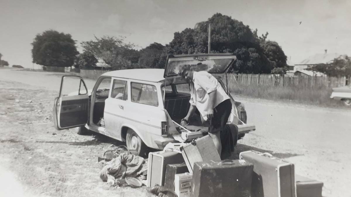 Arthur packs his car in the 1960s.