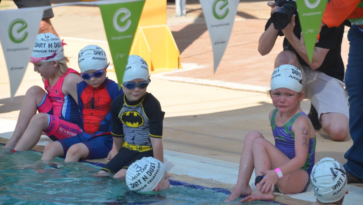 GIVE IT A TRY: Some of the smaller competitors were happier than others to be taking part in the Julia Creek Dirt N Dust junior triathlon last week. Photo: Derek Barry