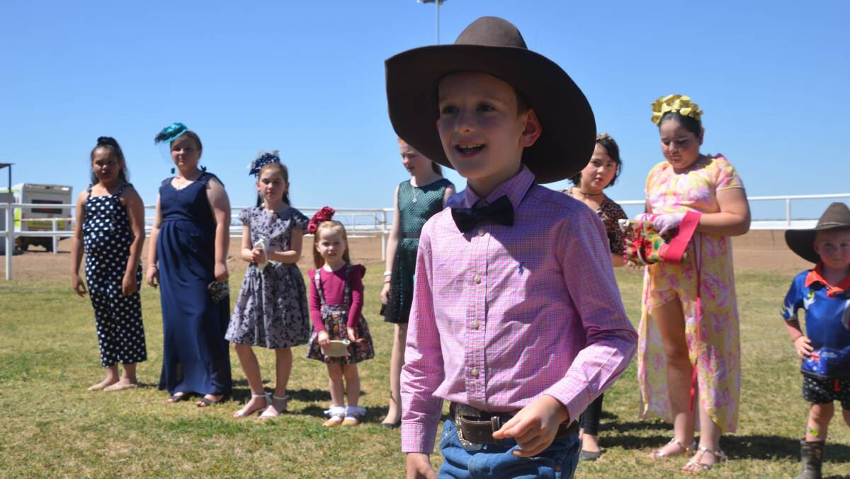 COWBOY CHIC: Camooweal youngsters were dressed up in their finery for the fashions on the field in the annual race day on Saturday. Photo: Derek Barry